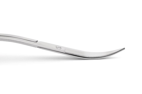 Photo montrant les lames ondulatoires des ciseaux de style ondulatoire